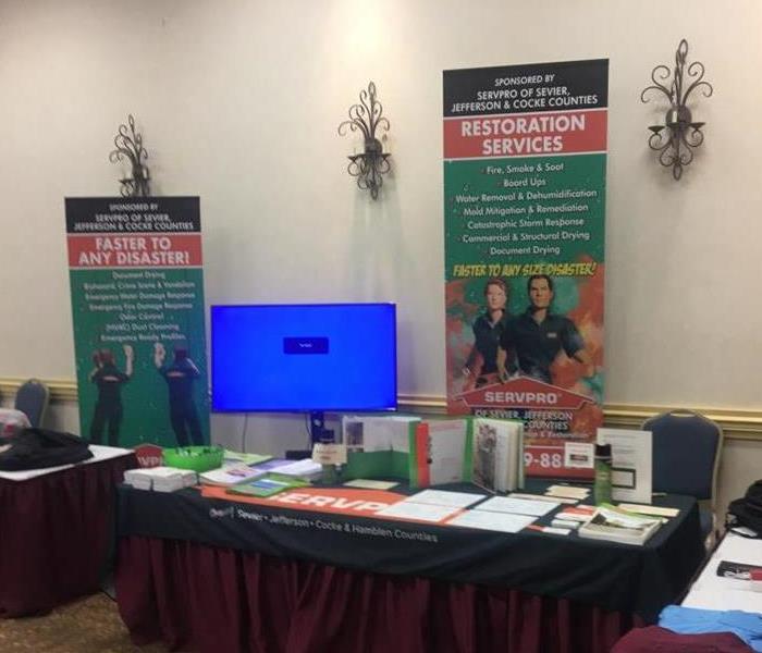 Table with informational materials for SERVPRO