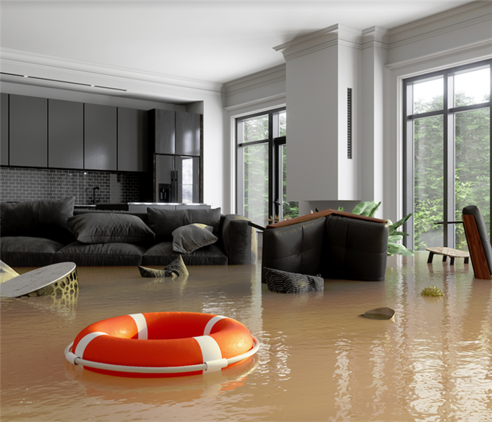 a flooded living room with furniture floating around